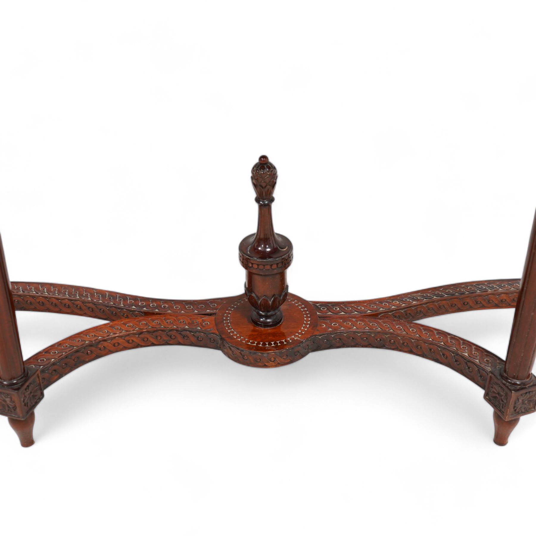 Mahogany demi-lune console table, moulded top over flower head guilloche decorated frieze, on turned and acanthus carved supports with fluted decoration, united by shaped stretchers with central finial 
