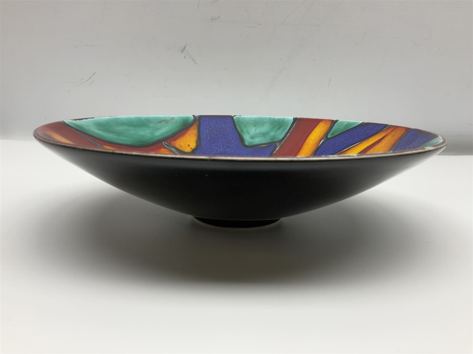 Four pieces of Poole Pottery in Graffiti pattern, comprising pair of vases of baluster form, dish and small plate, with impressed or printed marks beneath, vase H17cm