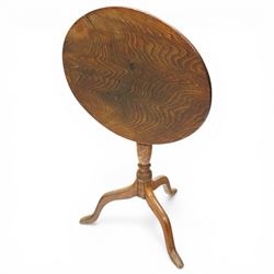George III figured elm wine table with oval flip-top, raised on turned vasiform pedestal with tripod base