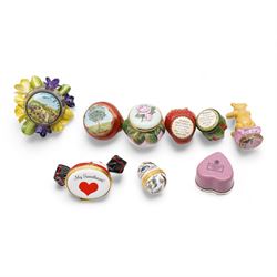 Halcyon Days enamel trinket boxes including 'My Sweetheart', Strawberry, Fabergé inspired heart-shaped box, small egg-shaped box, Rosebud, 'Primroses & Violets' etc, together with a porcelain model of a Teddy bear with agate base (9)