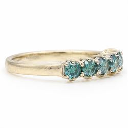 14ct white gold fancy blue diamond ring, set with seven round brilliant cut diamonds, stamped 14k, total diamond weight 0.94 carat
