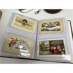 Postcards including WW1 silk postcards, local interest and photographic postcards, gas mask in box, material tape measure and metal sign. 