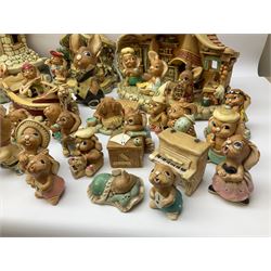 Extensive collection of Pendelfin rabbits and stands, to include Betsy Barge, Fruit Shop, Uncle Soames, Event Piece etc, many with original boxes 