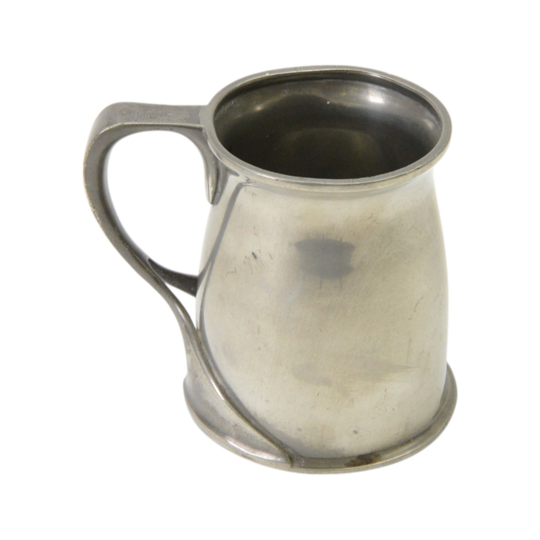 Liberty & Co Tudric pewter tankard, designed by Oliver Baker, model No.066, with a flared rim and whiplash scroll handle, stamped beneath Tudric English pewter, Libery & Co 066