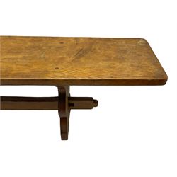 Gnomeman - adzed oak narrow bench, rectangular seat on shaped end supports united by pegged stretcher, carved with gnome signature, by Thomas Whittaker, Little Beck 