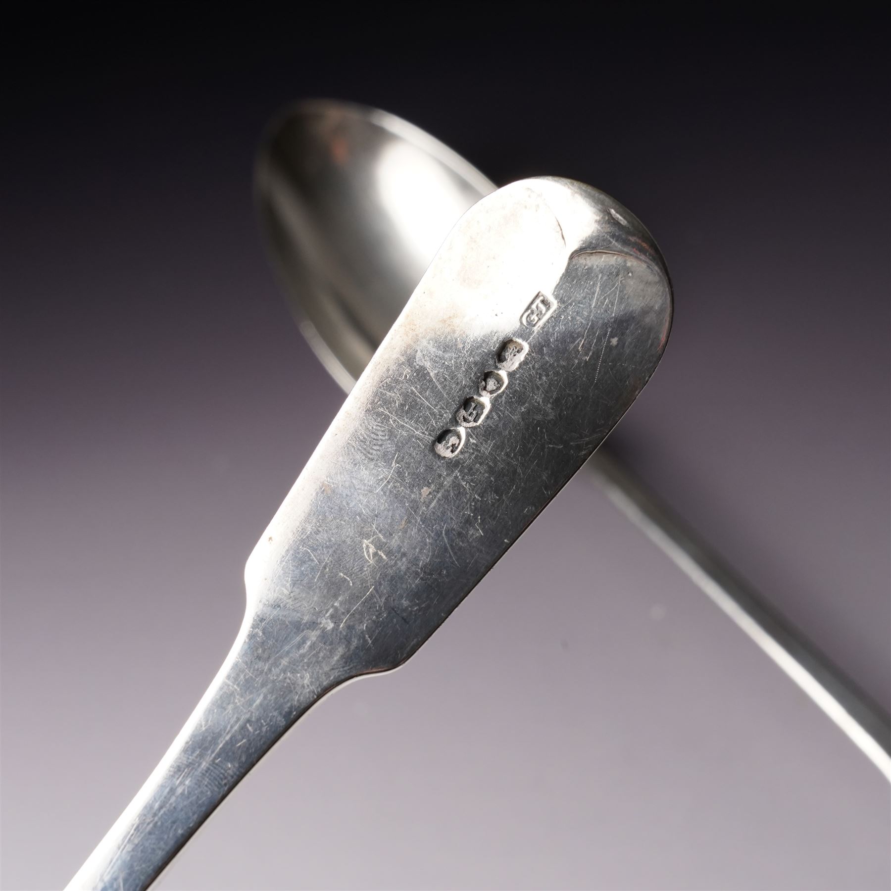  George IV silver fiddle pattern basting spoon engraved with monogram London 1827 Maker Clement Cheese and another London 1823 Maker George Turner (2)