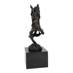 Stylised bronze model of an openwork horses head, signed Gadi and with foundry mark, raised upon black marble plinth, H41cm