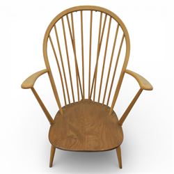 Ercol - Mid 20th century elm and beech Windsor armchair, the hooped spindle back over a shaped elm seat, with scroll front armrests on turned supports, raised on splayed tapering legs united by stretchers, lacking loose seat cushion