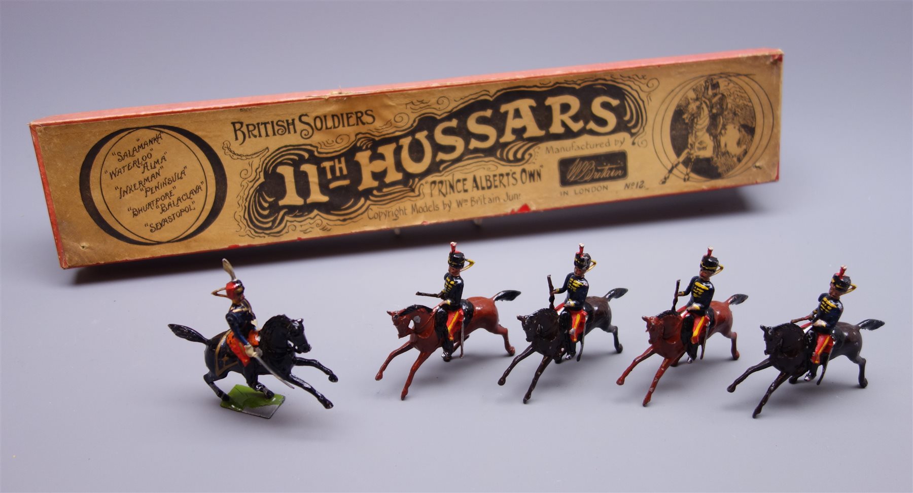Britains Set No.12 11th Hussars 'Prince Albert's Own' with four Hussars on cantering horses and