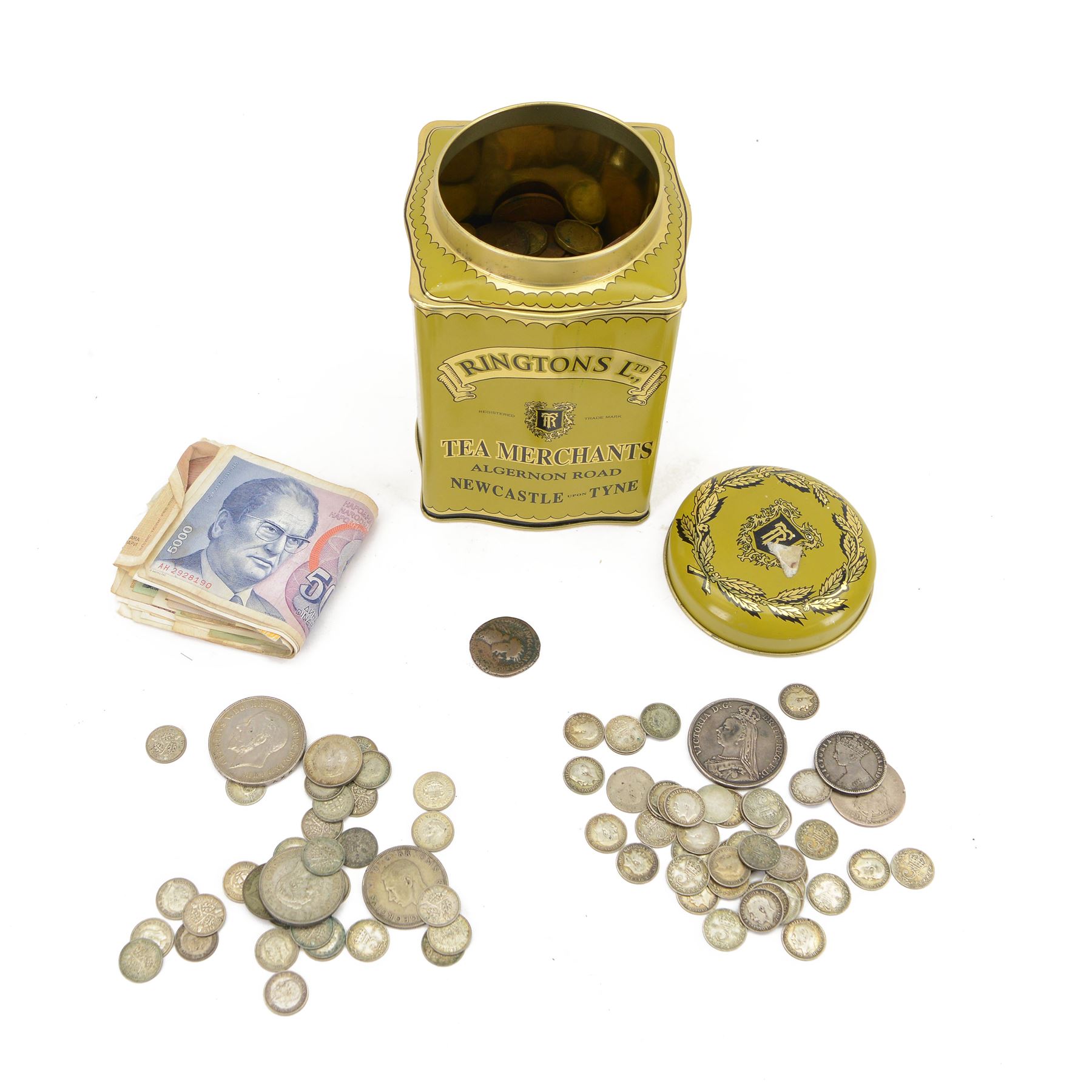 Queen Victoria 1891 silver crown coin, Queen Victoria 1849 'Godless' florin, Queen Victoria 'Gothic' florin (date rubbed), approximately 43 pre-1920 silver threepences, approximately 112 grams of pre-1947 silver coins, Roman Germanicus coin, and further Great British and World coins and banknotes, hosed in a green Ringtons tin