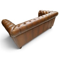 Barker and Stonehouse - traditional shape 'Ullswater' three seater Chesterfield club sofa, rolled back and arms upholstered in buttoned tan leather with studwork, raised on turned feet