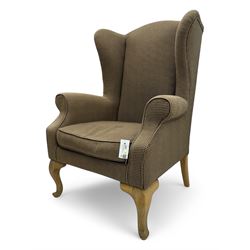 Hardwood-framed wingback armchair, upholstered in dog tooth pattern fabric, on cabriole supports 
