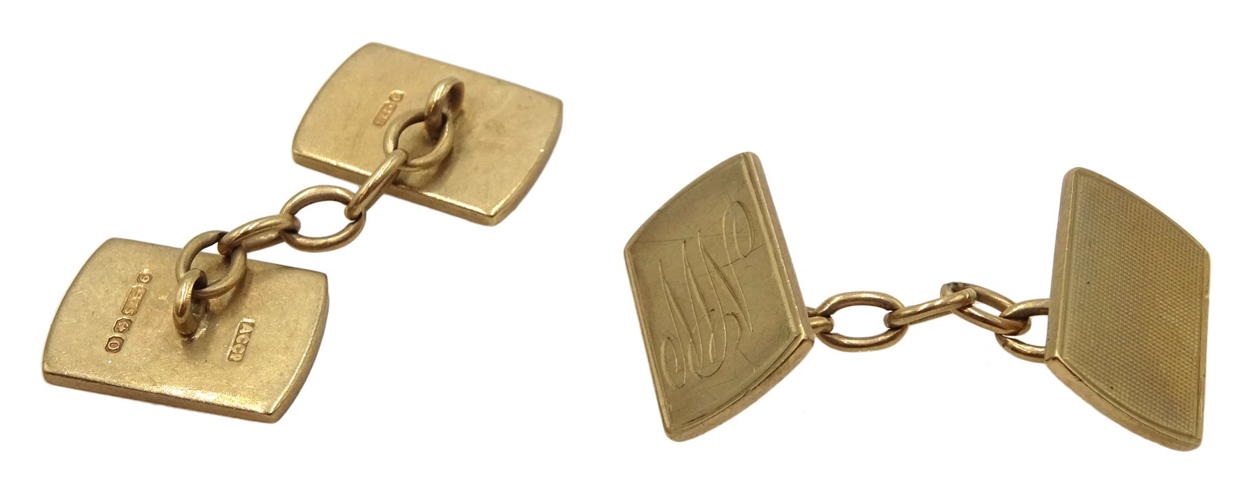  Pair of 9ct gold cufflinks, engine turned decoration and engraved initials 'NW' approx 10.28gm  