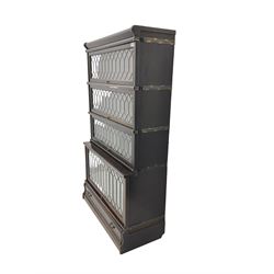 Globe Wernicke - early 20th century oak stacking library bookcase, enclosed by four lead glazed doors, fitted with single drawer