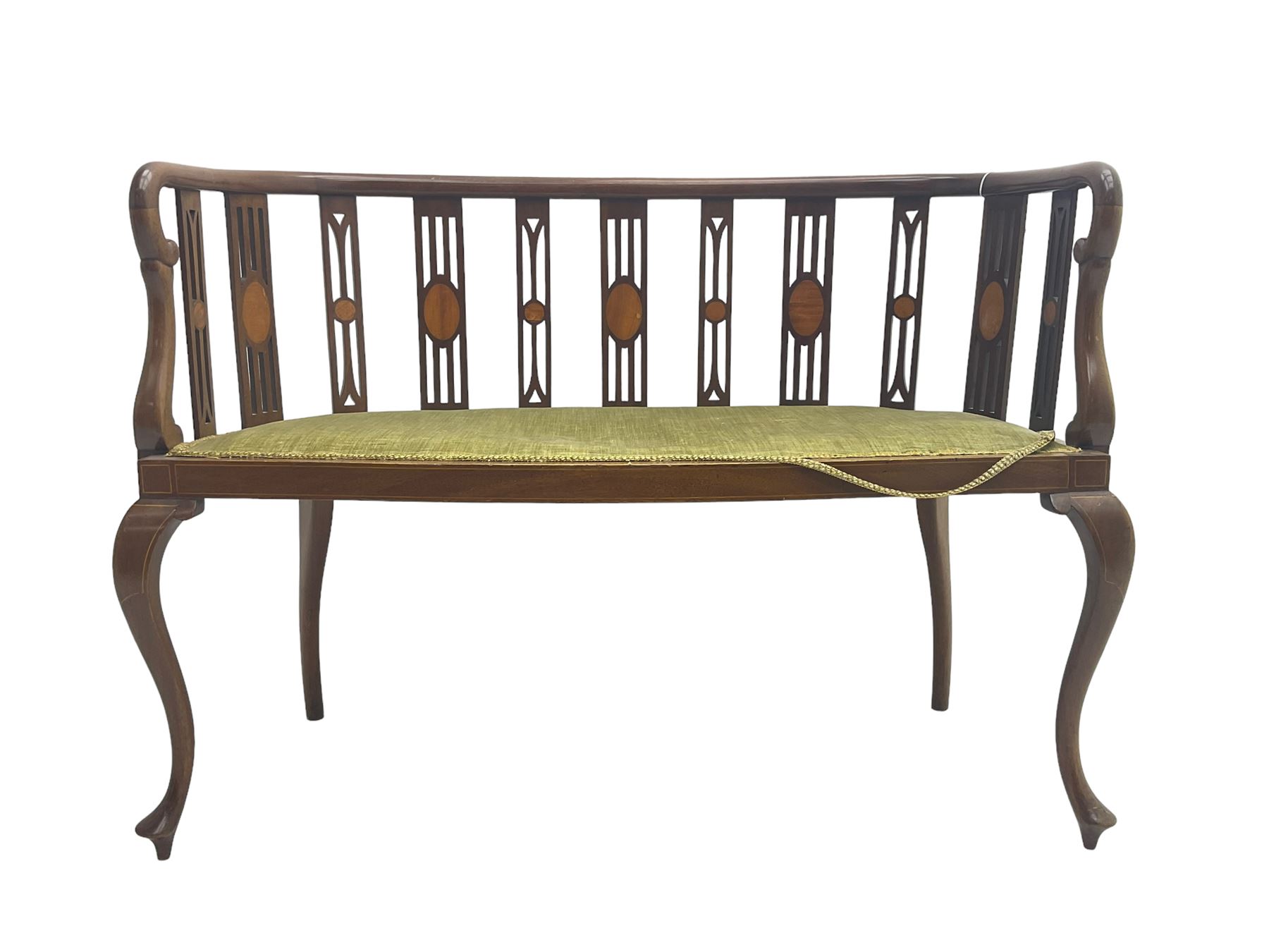 Edwardian inlaid mahogany salon settee or bench, the pierced and inlaid splat back over serpentine front, seat upholstered in laurel green velvet, raised on cabriole supports with satinwood stringing