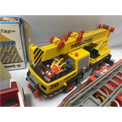 Collection of 1980s/90s Playmobil - vehicles including Fire-Engine No.21, Mobil Crane No.28, Quick Service Truck No.1 with trailer, Dumper Truck, GSL Sports car, GS Turbo car and three motorcycles; together with boxed Knights Tournament Set, Playmospace Space Station and Shuttle, wigwam and various accessories and figures etc