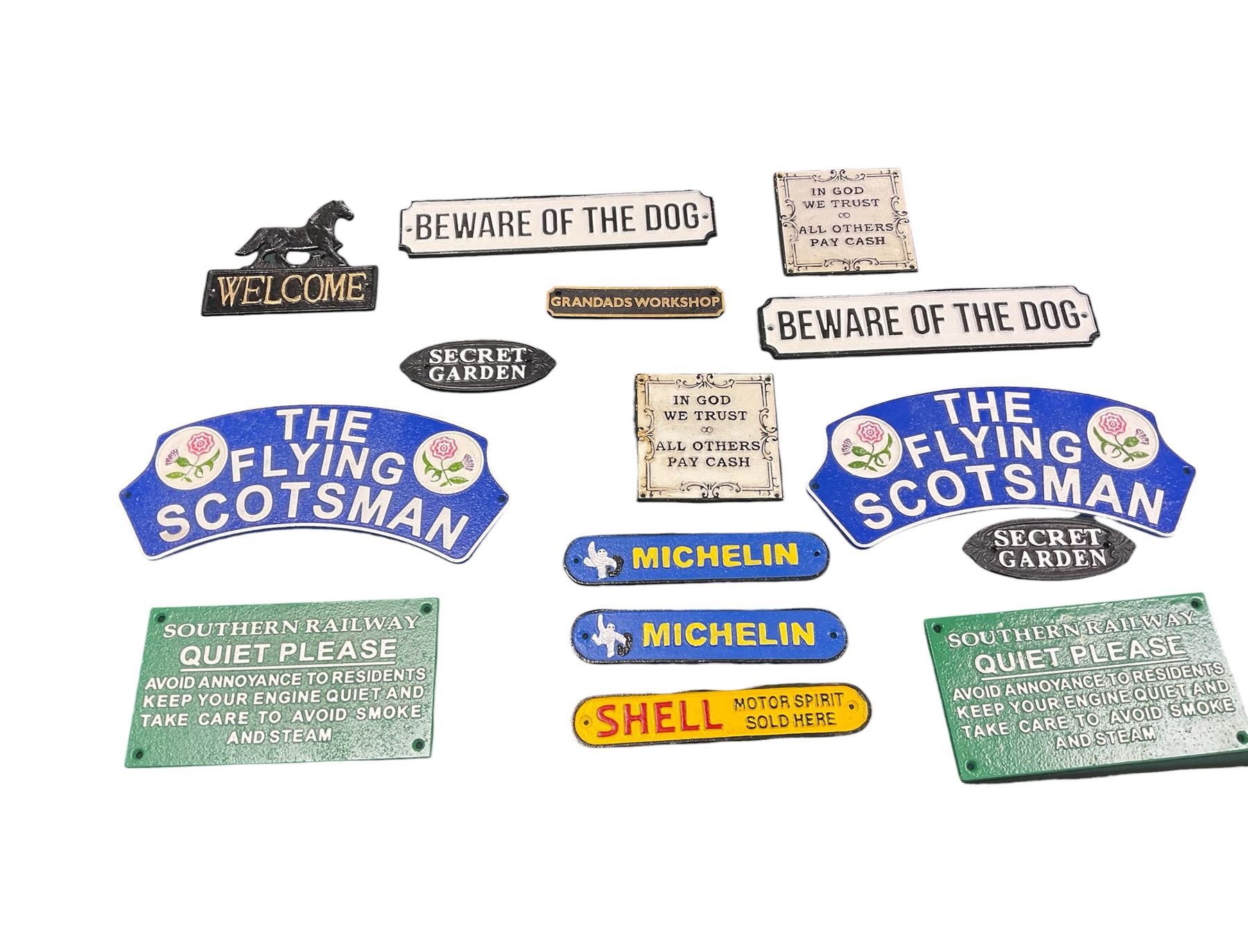 Collection of cast iron signs, including The Flying Scotsman, Quite please, Shell etc 