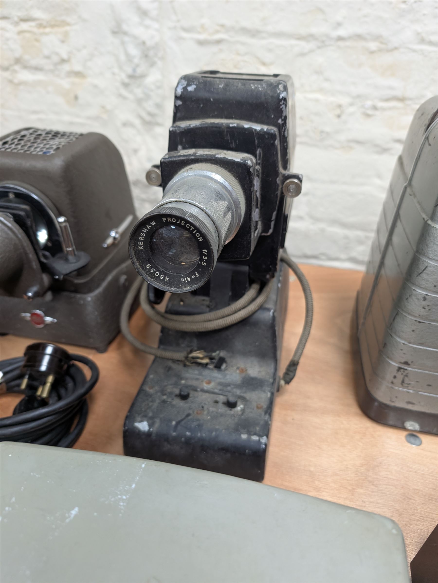Eight vintage projectors, including Bell & Howell Moviemaster, Aldis 303, Boots Colormaster, Ernst Plank, Hi-Lite etc