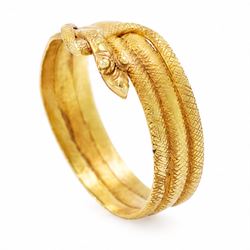 19th century 18ct gold coiled snake ring, the body with textured decoration