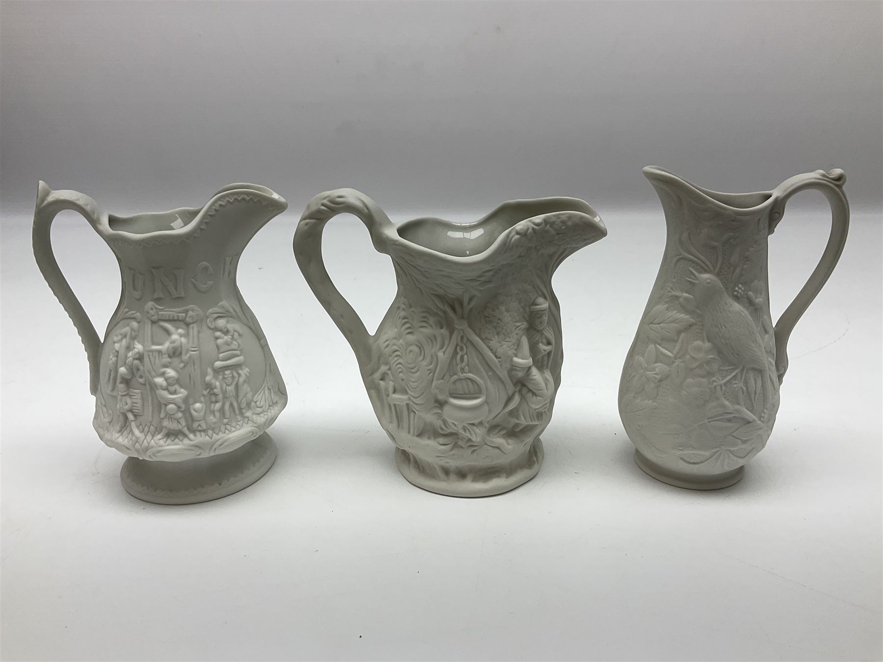  Six Portmeirion British Heritage Collection parian jugs, of various designs, H12cm