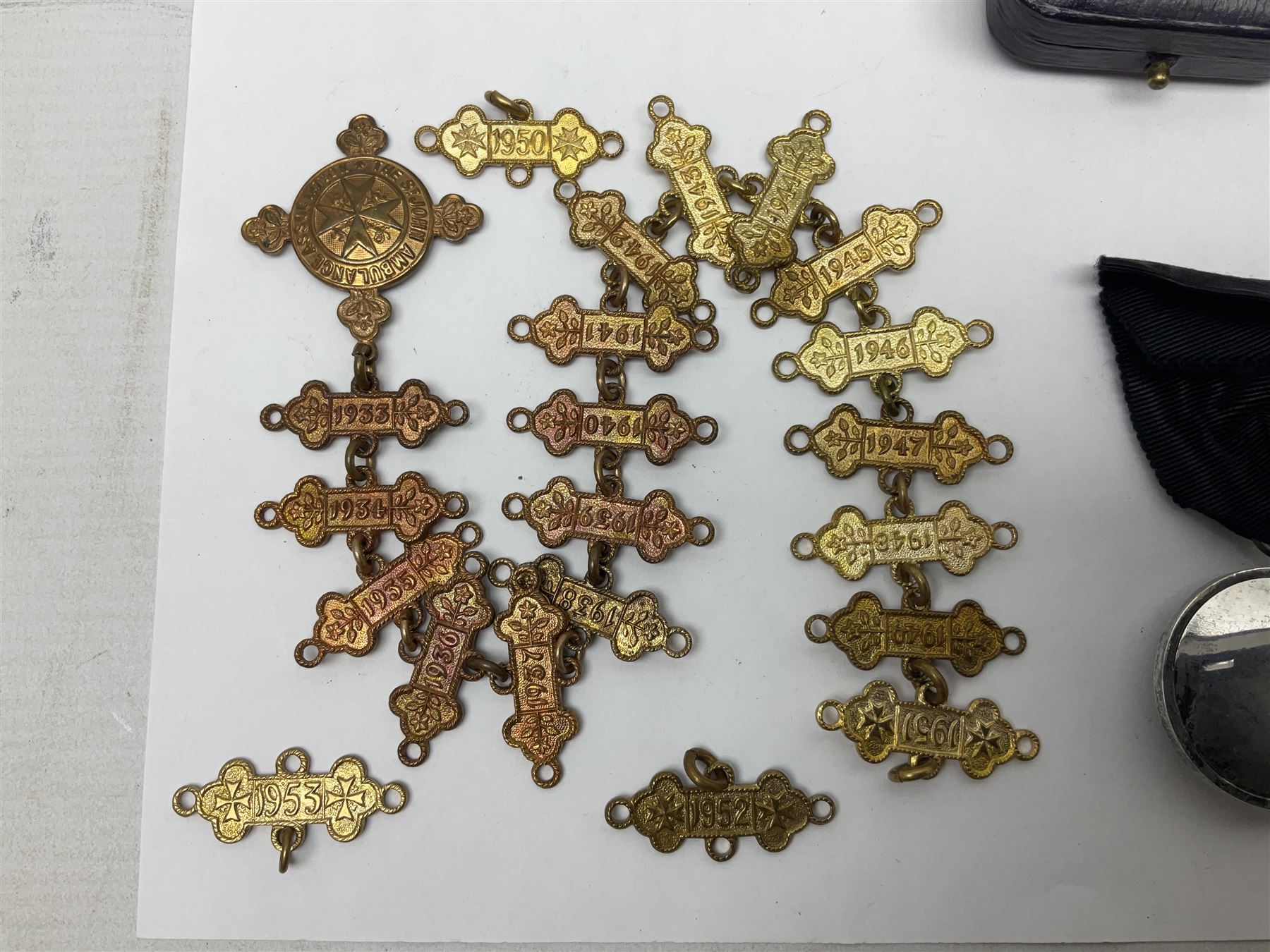 Four St John's silver fobs, together with two silver Directors Ambulance shield fobs and two other St Johns items 