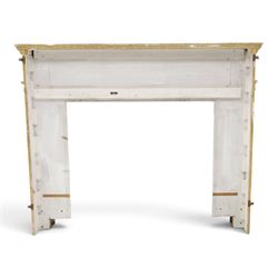 Large Adam's design white painted Neoclassical fire surround, the frieze moulded with goddess and cherubic motifs with bellflower festoons, egg-and-dart moulded inner slip flanked by Ionic capitals on classical columns