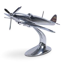 Modern polished metal model of a Spitfire, H36cm