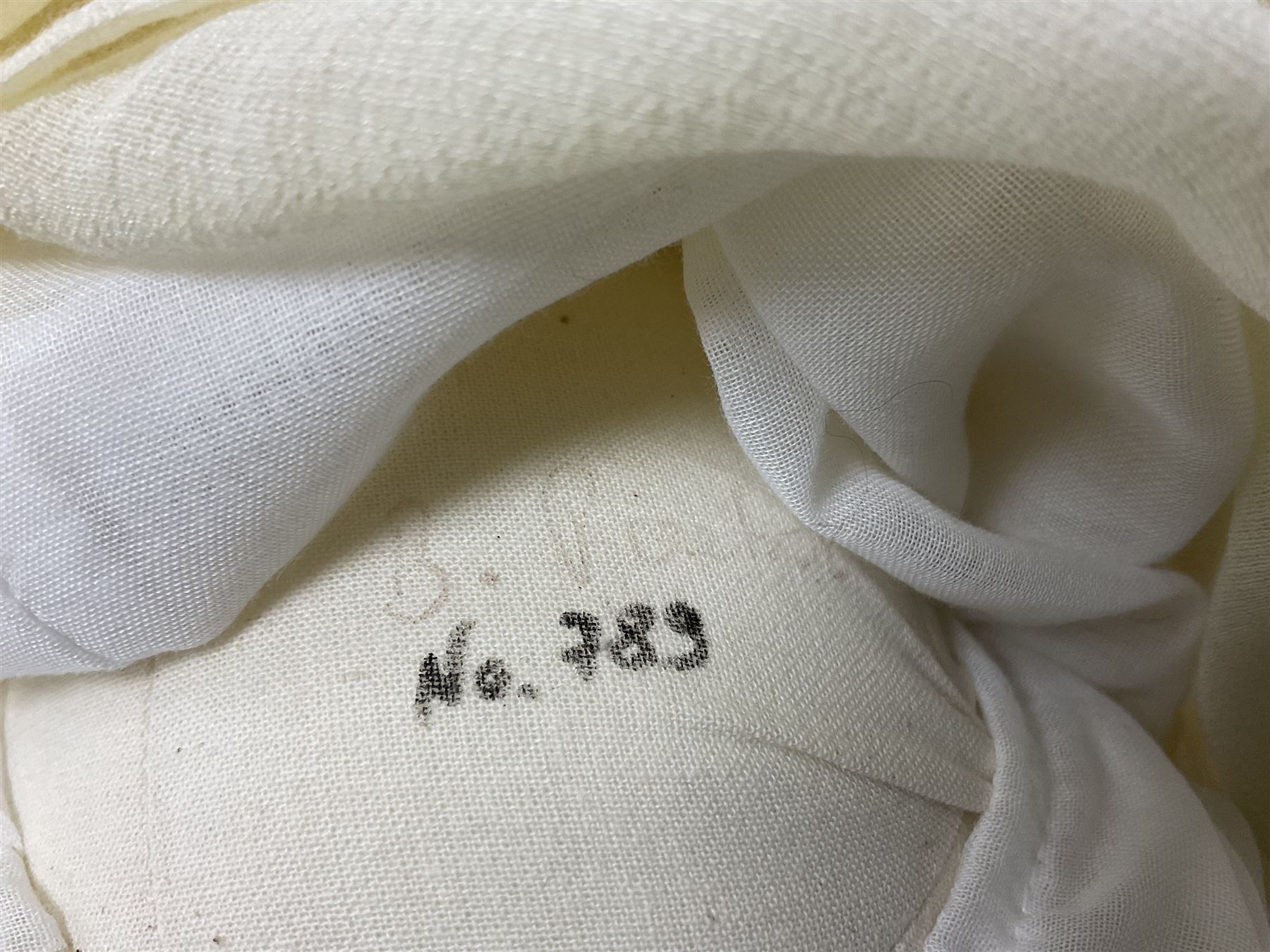 Two Zapf Creation limited edition designer collection dolls, by Brigette Paetsch, the first example with faux suede jacket, red jumper and denim skirt, no. 460, the second example 'Linda' in white dress with teddy bear accessory, no. 785, each signed B Paetsch, tallest L60cm