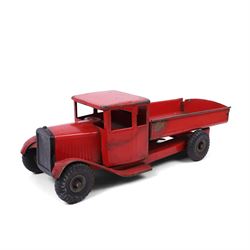 Tri-ang/Line Bros Ltd tin plate tipper truck, red body with black rubber wheels and red se...