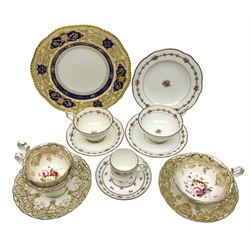Collection of Coalport tea wares, comprising three teacups and two plates in beige batwing pattern, finely decorated with enamel floral sprays within gilt reserves, teacup trio, smaller teacup and saucer, and coffee can and saucer, all decorated with pink rose sprays no 5960, and larger plate retailed by James Green & Nephew London decorated with reserves of raised gilt foliate motif and urns on cobalt blue ground, largest D23cm