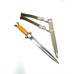 WW2 German Deutsches Rotes Kreuz (Red Cross) Leader's dagger with unmarked 24.5cm double edged steel blade, white metal hilt with cut-down oval langet and ribbed orange plastic grip, the hammered white metal scabard with slightly off-set square suspension rings and silvered/silver thread hanging straps L39cm