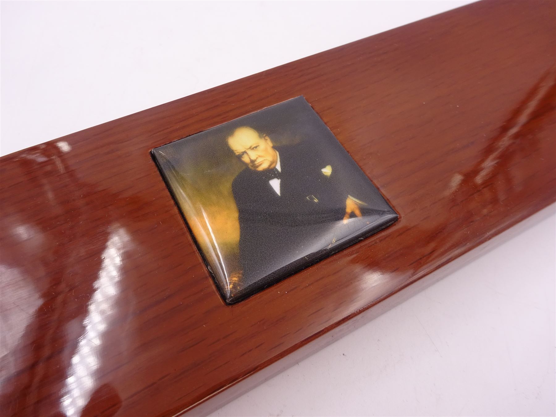 Modern silver 'Churchill Rule of Life' ruler, by Richard Jarvis of Pall Mall, engraved with the significant events and dates of Winston Churchill's life, from his birth in 1874 to his funeral in 1965, hallmarked Richard Jarvis, London 2007, L33.5cm, within wooden fitted case, with applied portrait to cover and silk and velvet lined interior