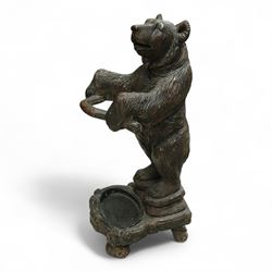 Early 20th century Black forest bear design stick stand, composite wood model of a bear with arms outstretched holding a branch forming the stick stand above a drip tray on tree branch form feet 
