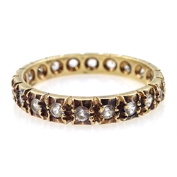  Gold stone set eternity ring, hallmarked 9ct and two brooches  