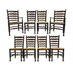 Set eight (6+2) oak dining chairs, high waived ladder back over rush seats, raised on ring turned supports with pad front feet, united by stretchers