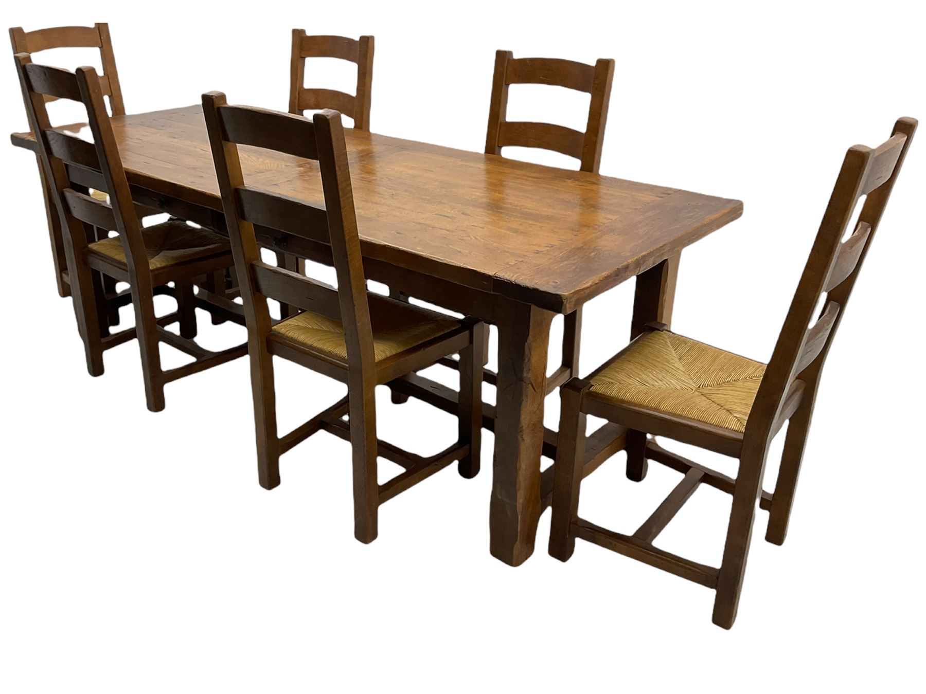 Antix French oak dining table with two leaves, two frieze drawers;, and six ladder back chairs with rush seats