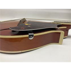 Eastern eight-string mandolin with sunburst finish and mother-of-pearl inlay L68.5cm; and another Harmony mandolin with cracked headstock (2)