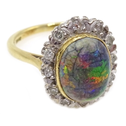  Black cabachon opal and diamond gold cluster ring, stamped 18ct and matching pair of stud earrings both purchased from Boodle and Dunthorne. boodles  