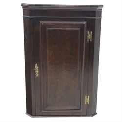 George III country oak corner cupboard, enclosed by single cushion panelled door, brass H hinges
