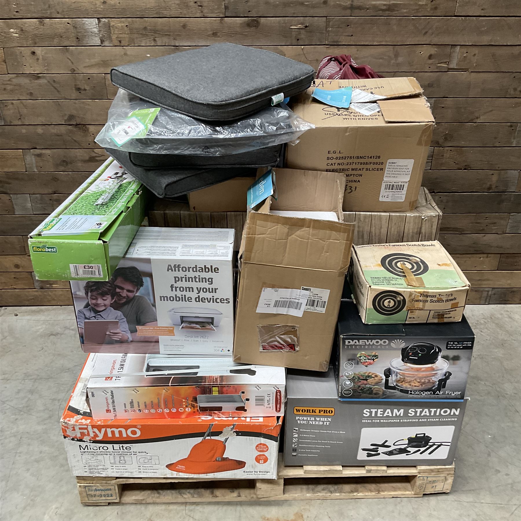 Collection of boxed items including a Flymo Micro Lite lawn mower, HP printer, Daewoo Halogen Air Fryer, an oil filled radiator etc