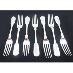 Seven silver Fiddle pattern forks with engraved initials to terminals, comprising set of five Victorian examples, hallmarked John Stone, Exeter 1845, a William IV example, hallmarked William Rawlings Sobey, Exeter 1836, and a Victorian example, hallmarked Samuel Hayne & Dudley Cater, London 1855, approximate weight 10.03 ozt (312 grams)