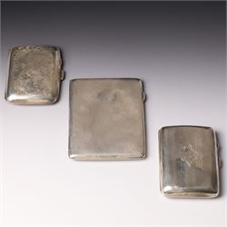 Engine turned silver cigarette case Birmingham 1935 10.5cm x 8cm and two smaller cigarette cases
