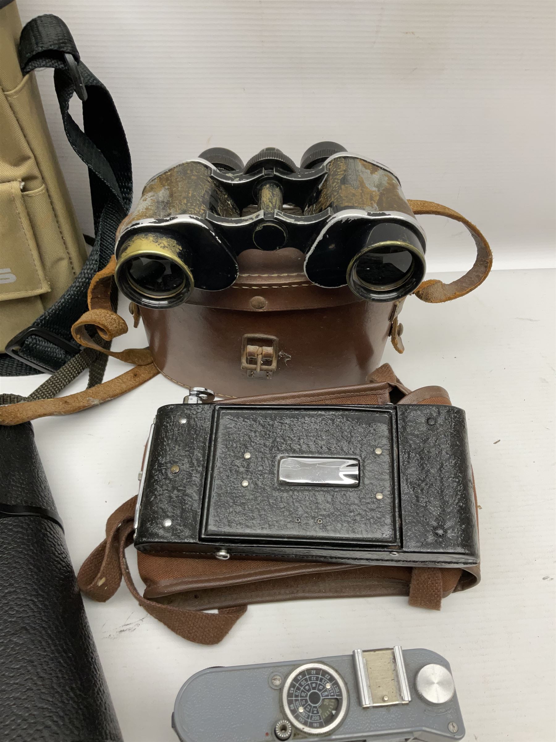  Russian Kronos binoculars 20x60, together with Farina 8x30 binoculars and two cameras, etc