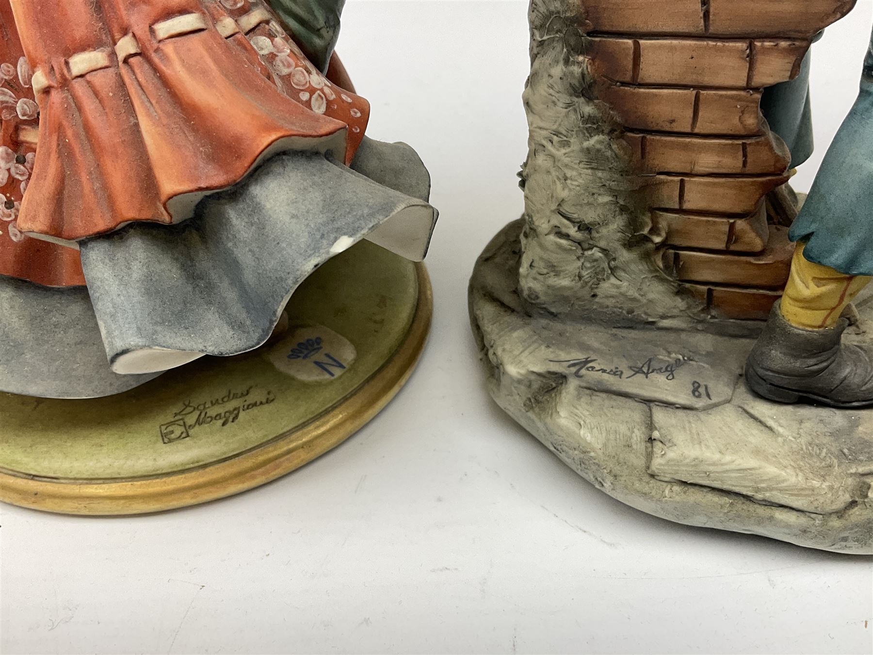 Four Capodimonte figures, comprising Shoemaker by T Galli, Tramp on Bench by Roby B, The Fiddler by Maria Angela, and Gypsy Dancers by Sandro, each with accompanying certificate, plus a Beswick matt glazed horse, and small Beswick pheasant. 