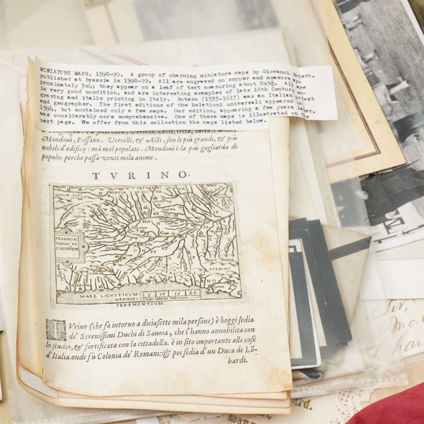 Ephemera including 19th century indenture, Victorian memorial cards and envelopes, sampler by Mary Wilson aged 11, 1940s photographs of George VI and royal family, miniature map of Turin circa 1600 and other items 