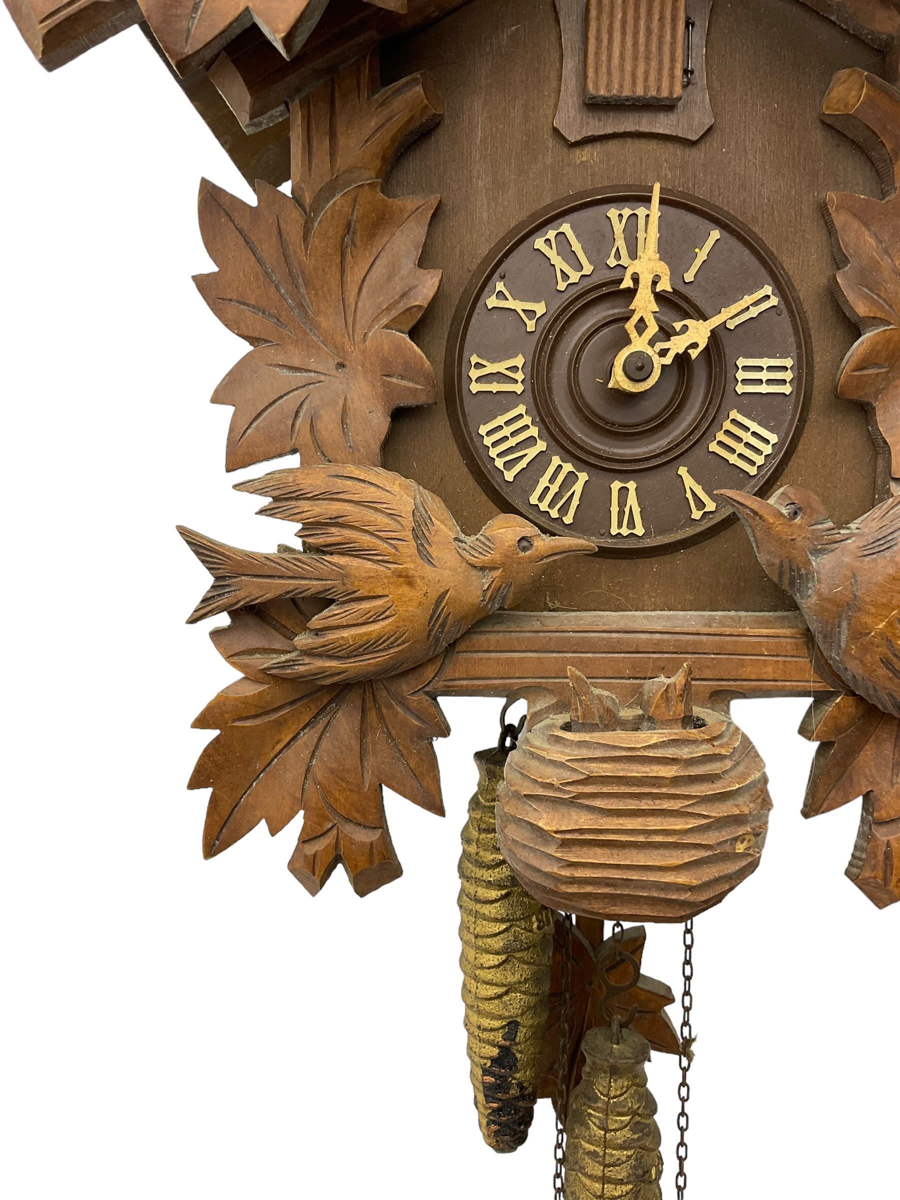 German 1960's cuckoo clock with automata traditional styled case and