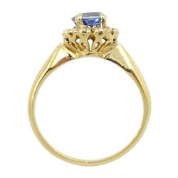 Gold oval sapphire and round brilliant cut diamond cluster ring, sapphire approx 1.05 carat