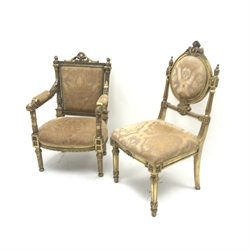 Gilt wood framed heavily carved armchair, upholstered in pale gold fabric with floral pattern, turned supports (W63cm) and similar single chair (W55cm)