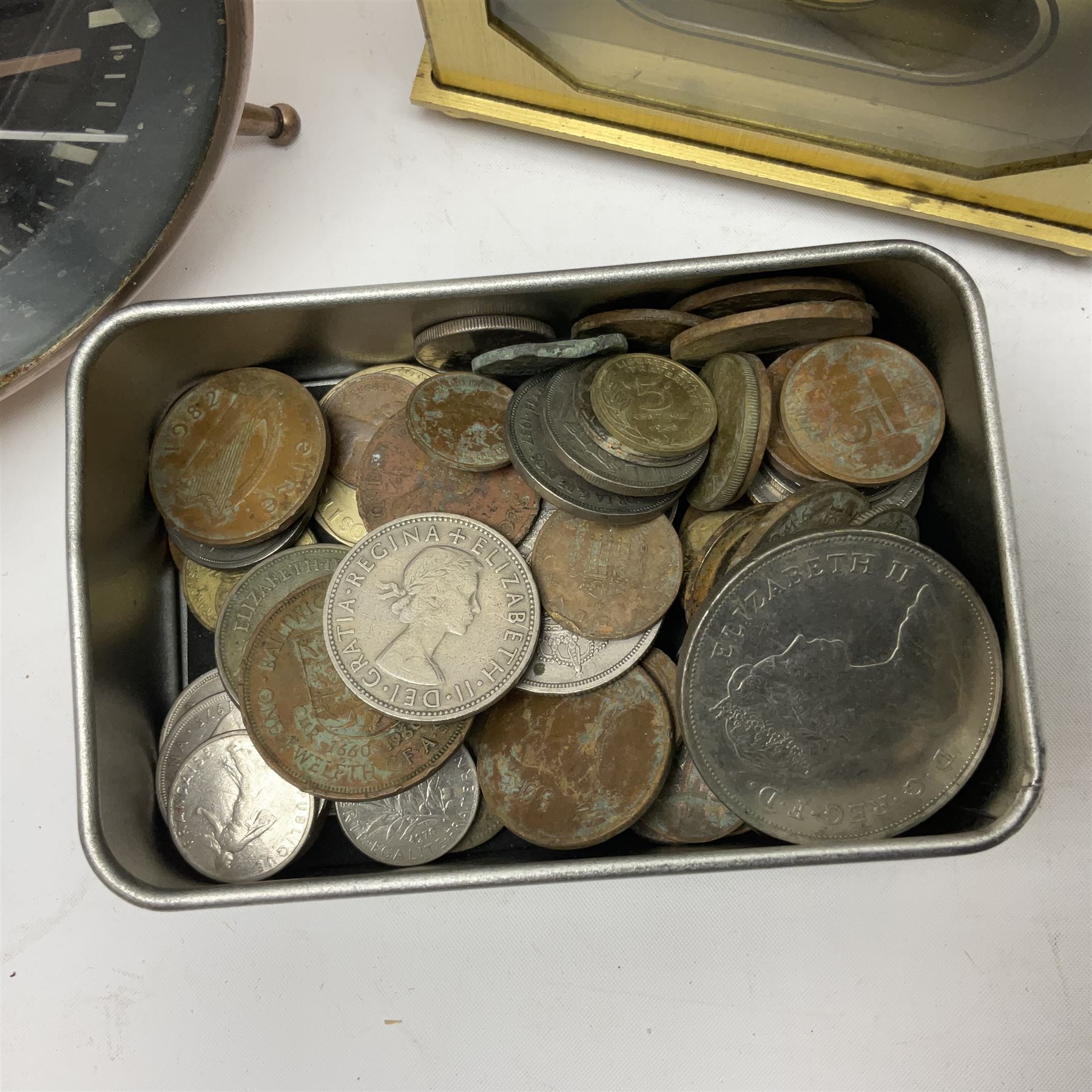 Avia Quartz mantle clock, a London alarm clock and a collection of coins