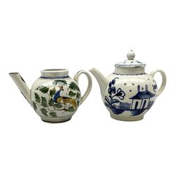 Two 18th century miniature or toy pearlware teapots, the first example lacking cover decorated with an exotic bird, the second with cover painted in underglaze blue with hut and fence, second example approximately H8cm